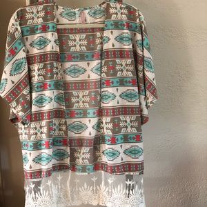 Beautiful satin and lace Santa Fe wrap.